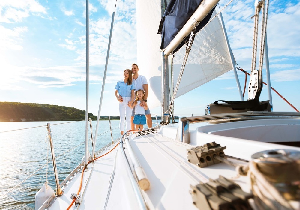 Yacht with a family on deck
